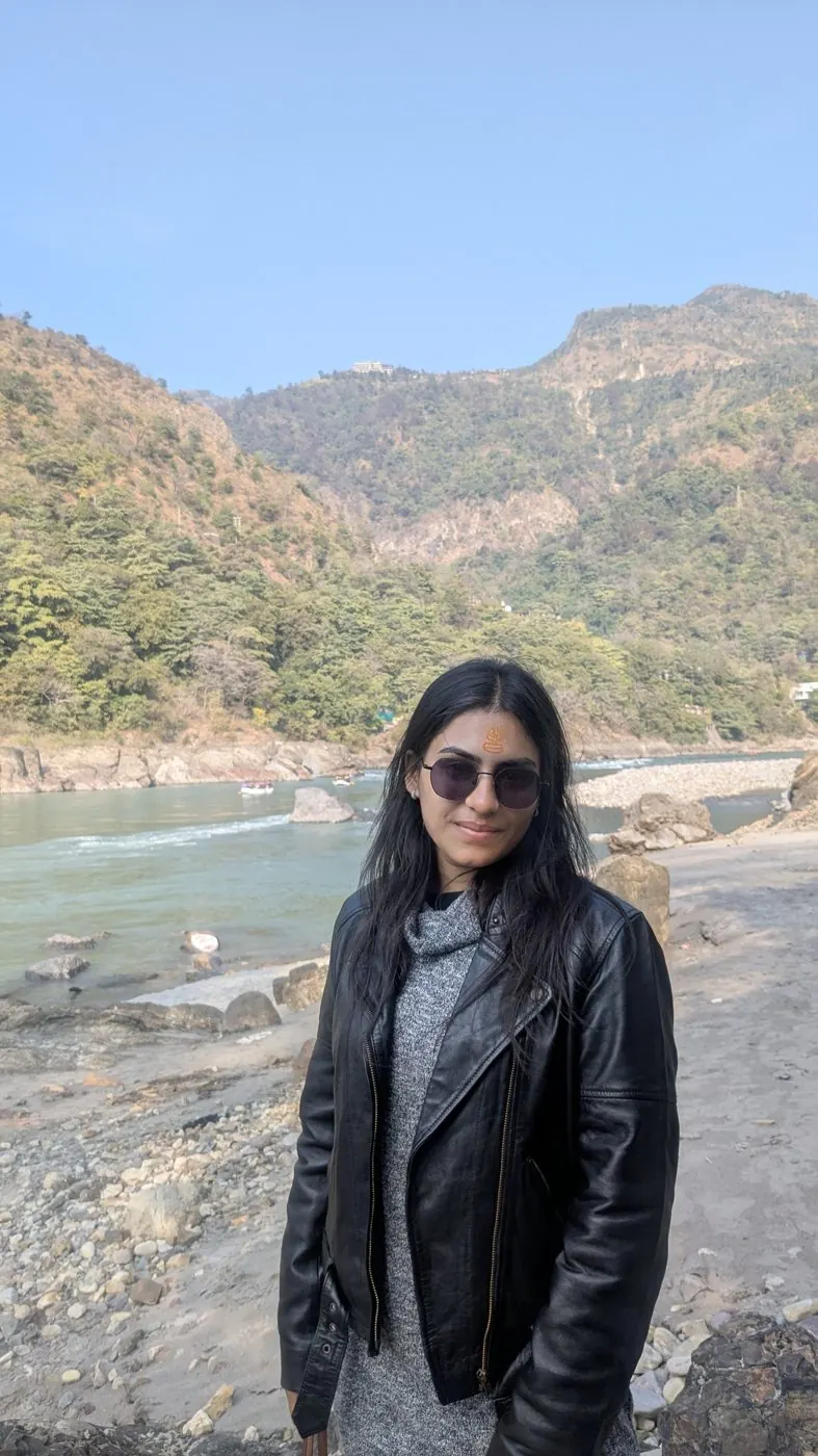 Barkha by the river and mountains